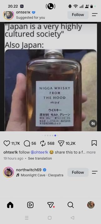 Text: Japan is a very highly cultured society. Then in the picture a whiskey bottle and label says "nigga whisky from the hood".
