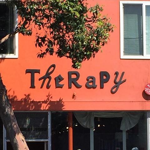 Novelty gift shop called Therapy but the font is in a mixed typeface style with an uppercase R so it reads like The Rapy