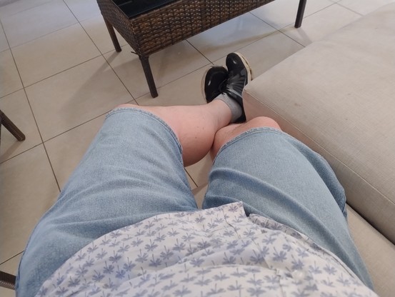 POV photo looking down at my legs, which are enjorted