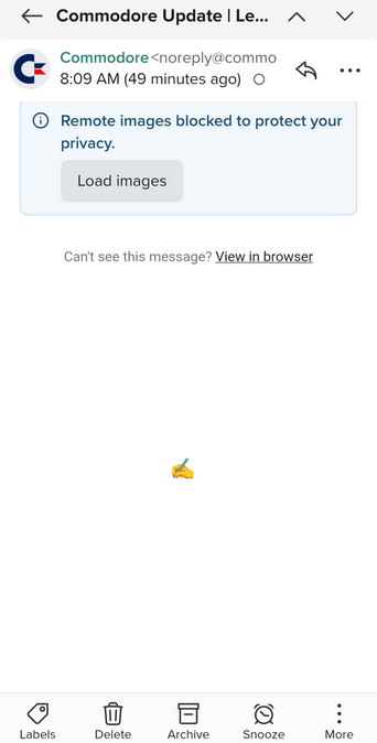 Screenshot of an email from Commodore that's entirely blank except for a thumbs up emoji in the middle of the page.