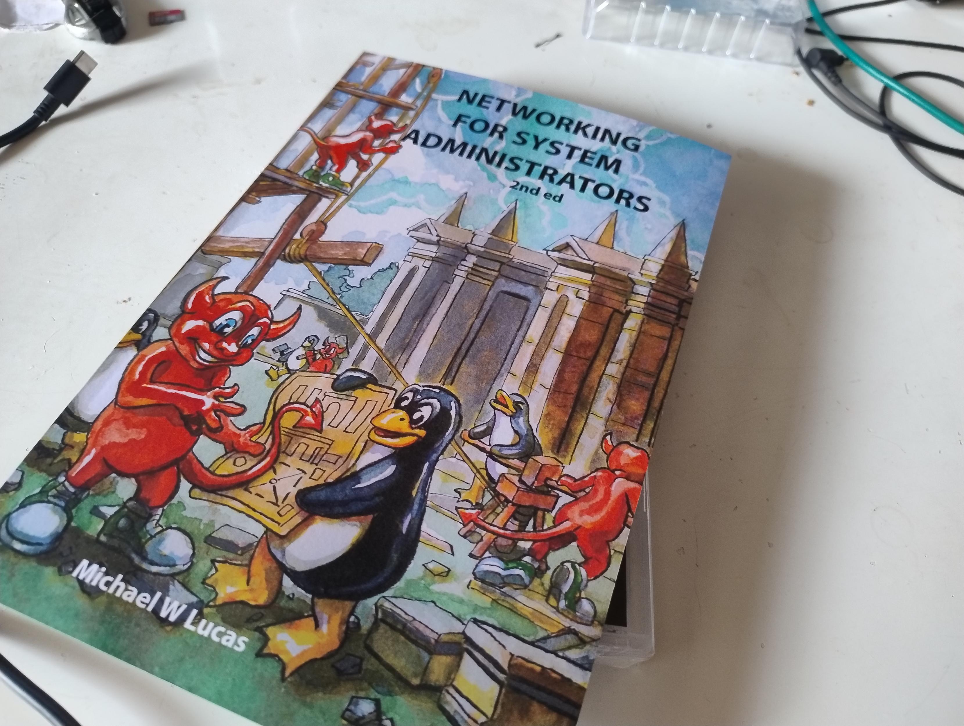 A paperback copy of Networking for System Administrators by Michael W Lucas