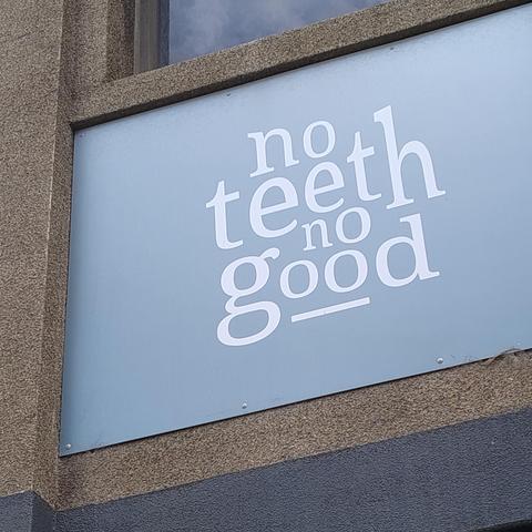 Sign on the front of a building saying 
