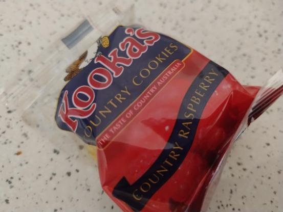 A sealed plastic packet of Kooka's Country Cookies.