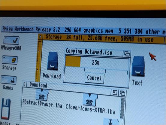 A small section of an Amiga work bench screen showing a file copy of octamed.iso in progress