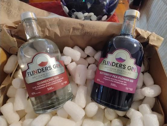 Two bottles from Flinders Gin, quandong and butterfly pea flower