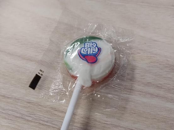 A lollipop in a wrapper with 