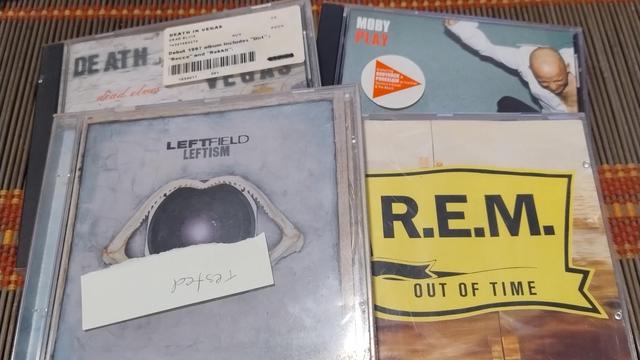 Four CDs on a table:
Death in Vegas 