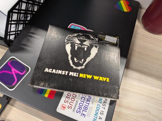 a CD copy of the Against Me album New Wave